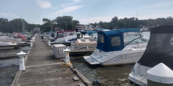 view from dock of boats in slips